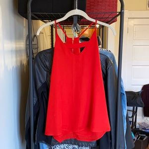 Red tank top with gold zipper detailing on back